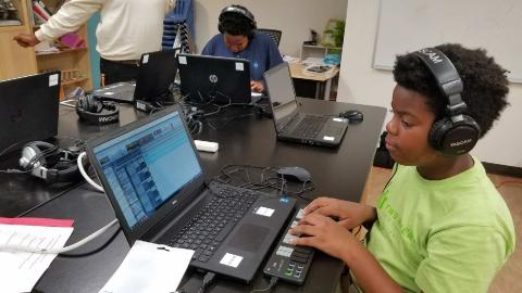 Student vibing to their music