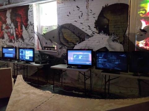 Gaming setup along wall