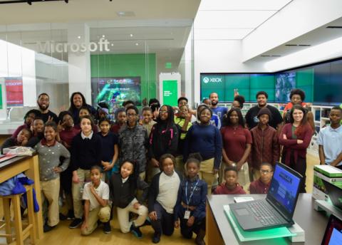 Staff and students posing for picture