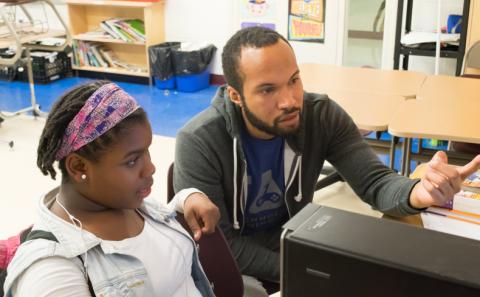Kreston working with Lasalle student