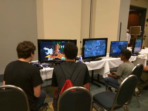 Attendees playing a variety of games